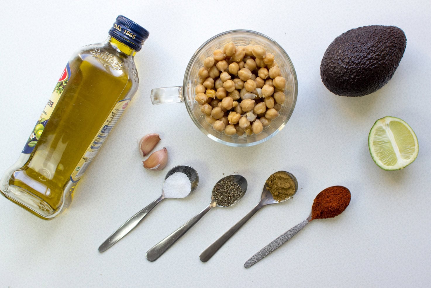 Hummus ingredients like avocado, chickpeas, olive oil, lemon, spices etc. | Hurry The Food Up