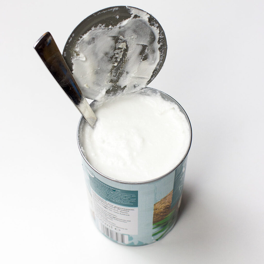 Coconut milk on white background