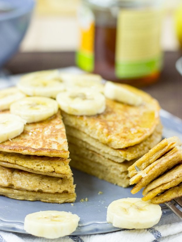 Cutting into a stack of oatmeal cottage cheese pancakes