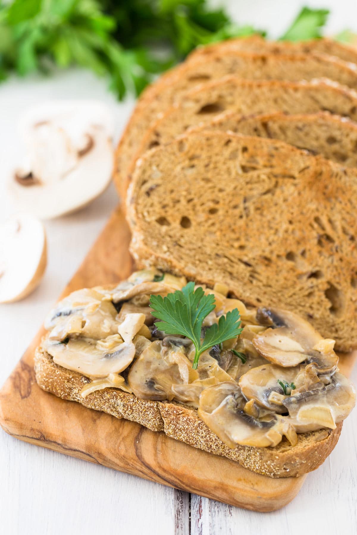 Slice of bread with creamy garlic mushrooms  | Hurry The Food Up