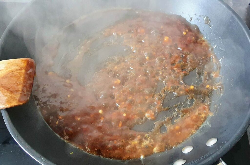 The ingredients are frying in the pan | Hurry The Food Up