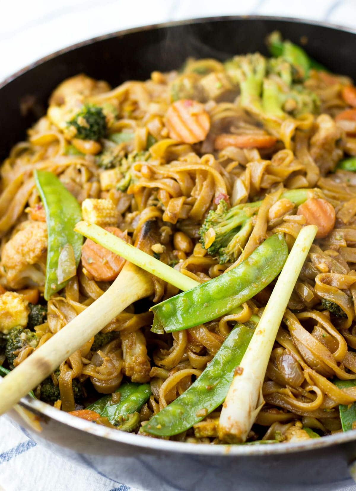 Peanut stir fry sauce over vegetable and noodle stir fry