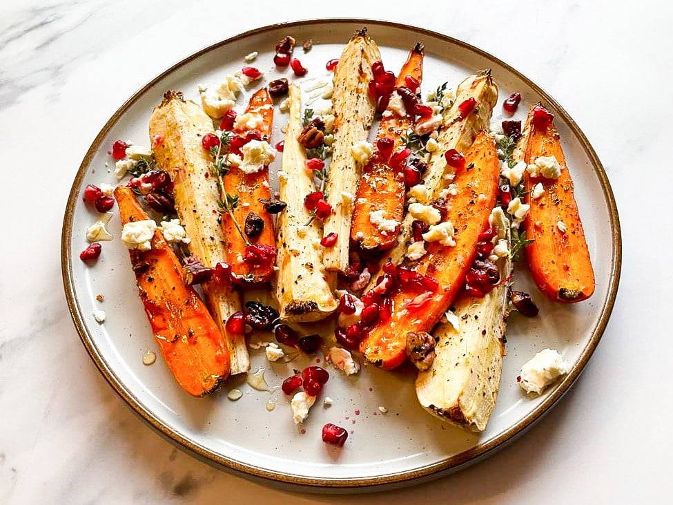 The dish is ready on the plate on the white table #pecans #rosemary | 
