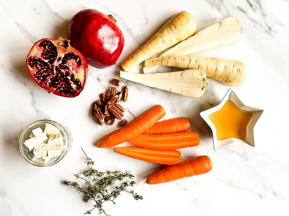 The ingredients are on the table - parsnips, carrots, pomegranate, feta, honey and pecans #rosemary #salt | 