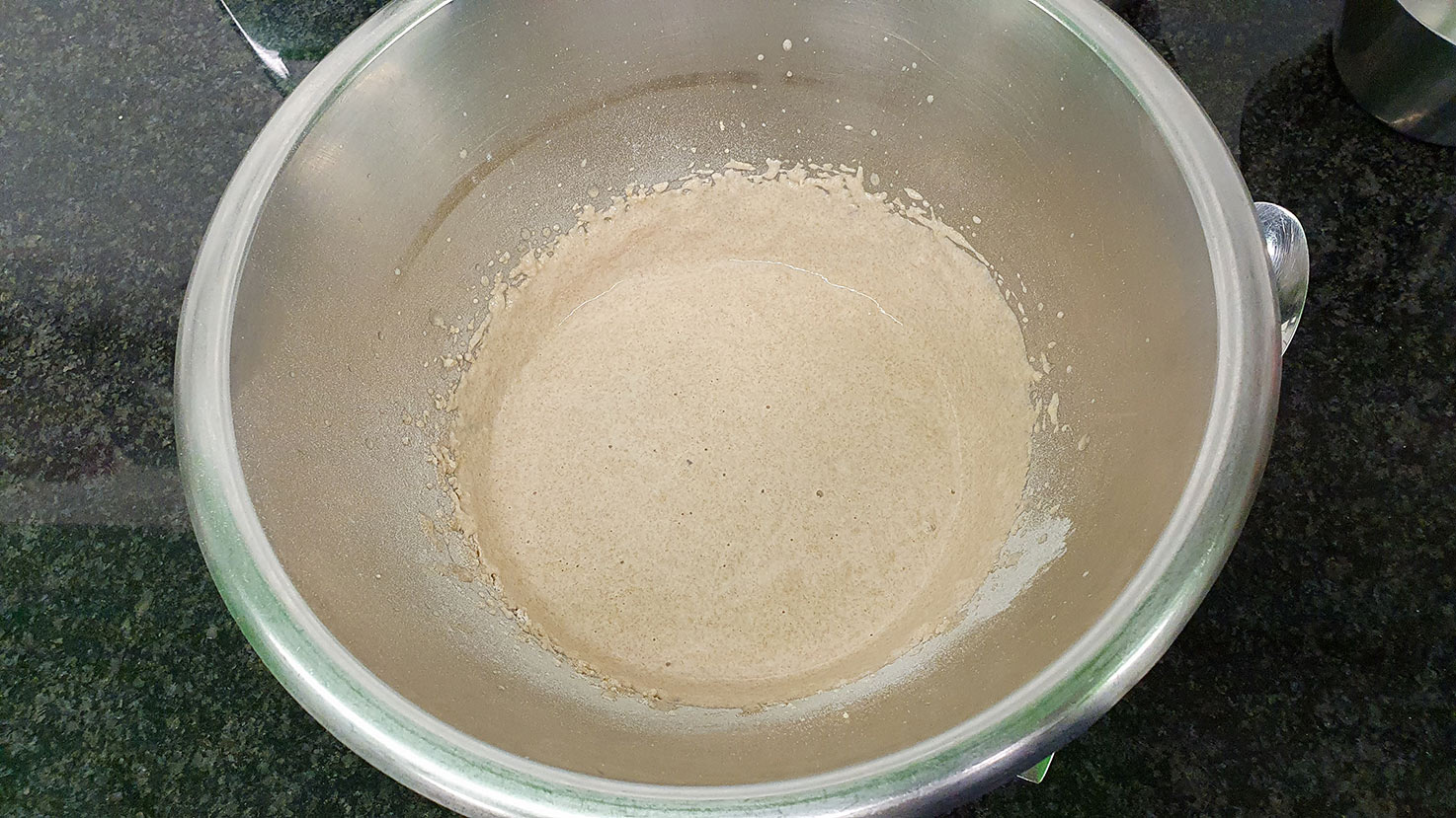 The mix of yeast, water and flour is blended in the mixing bowl #dried Italian herbs #mozzarella | 