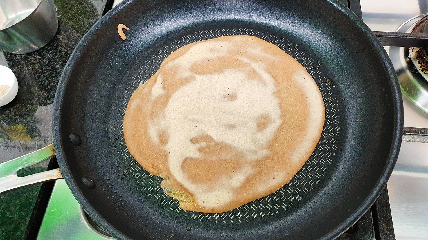 The dough is frying in the pan #olives #basil leaves | 
