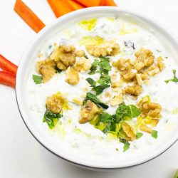 The dip is served on the table with chopped veggies #raisins #Greek yogurt | 