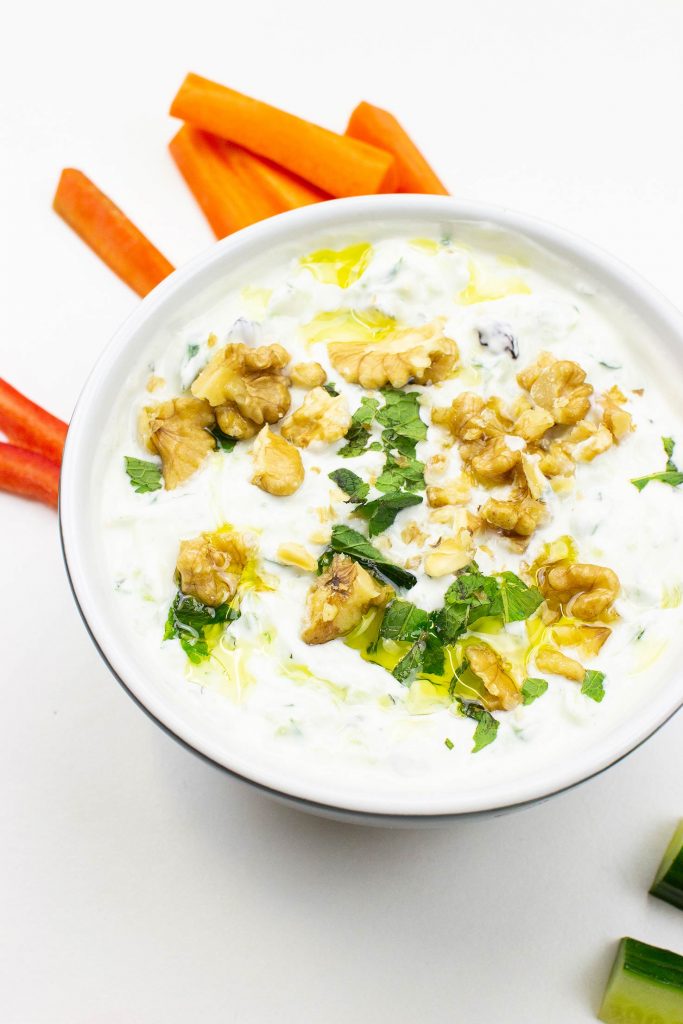 The dip is served on the table with chopped veggies #raisins #Greek yogurt | 