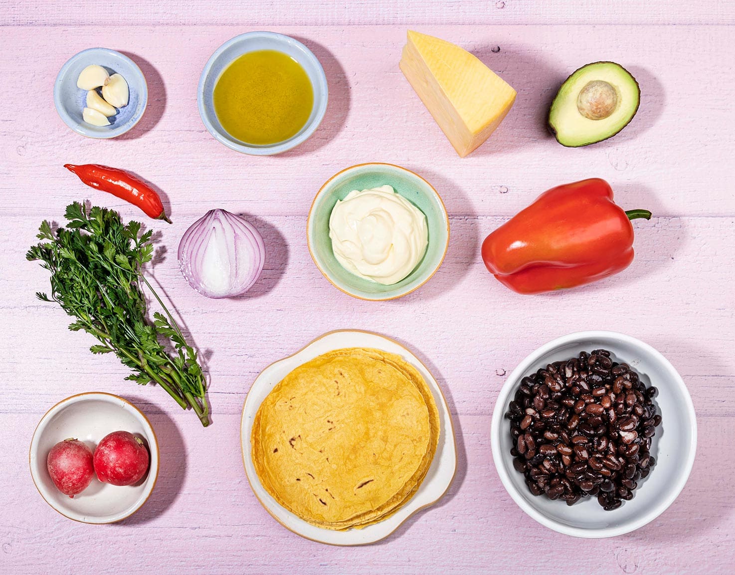 The recipe ingredients like black beans, olive oil, cheddar, tortillas, bell pepper, radishes, cilantro etc. | Hurry The Food Up