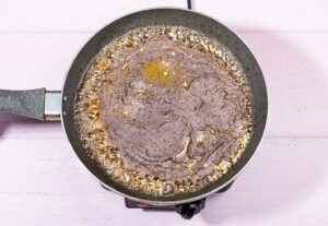 Black bean paste is frying in the pan | Hurry The Food Up