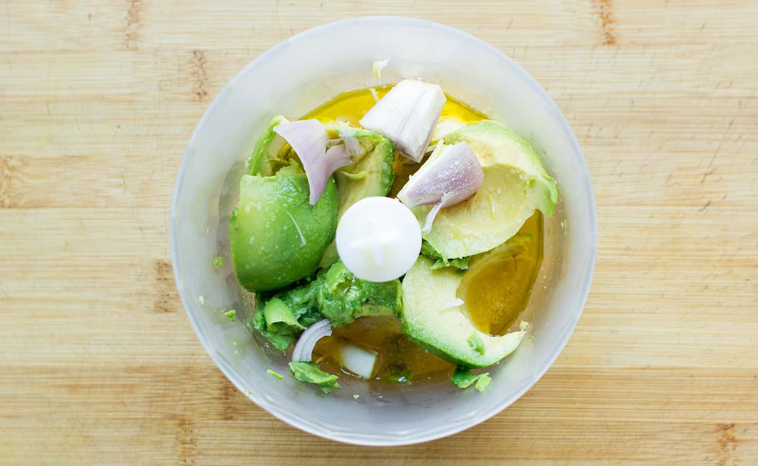 Avocado salad dressing ingredients in a food processor | Hurry The food Up