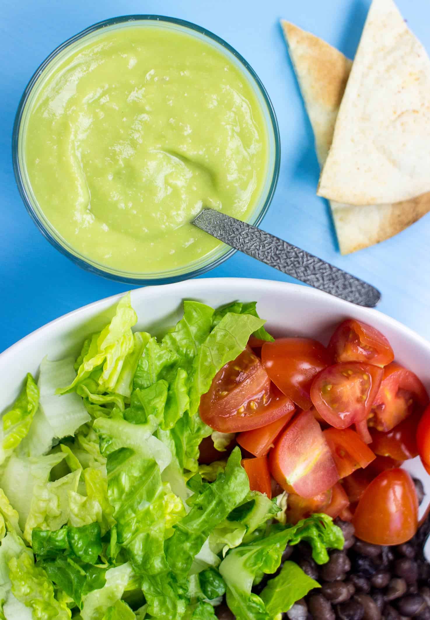 A bowl of avocado salad dressing and a plate of salad | Hurry The food Up