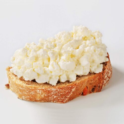 A slice of bread with cottage cheese | Hurry The Food Up
