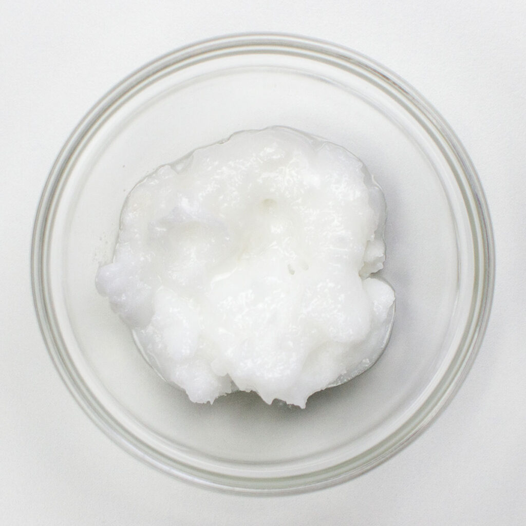 Coconut oil on white surface
