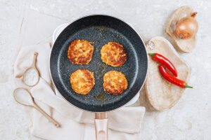 Roasted cottage cheese fritters are in the black pan | Hurry The Food Up
