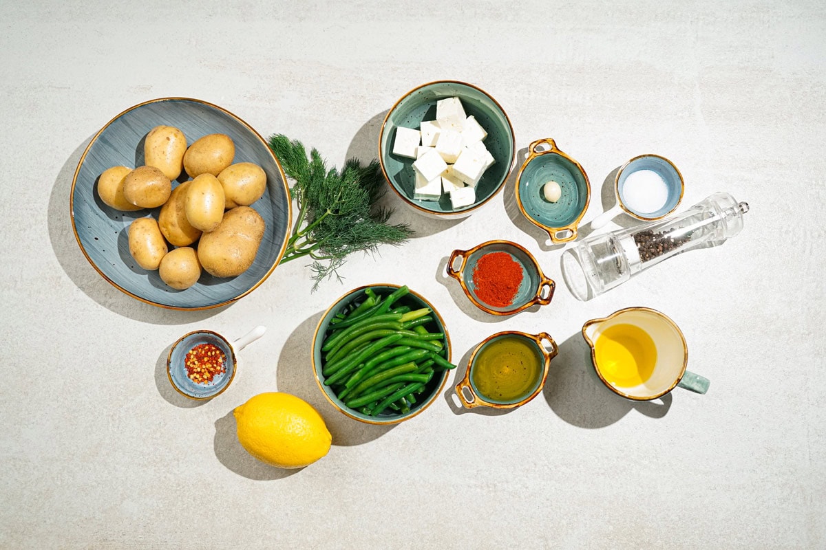 Smashed potatoes with feta dipping sauce ingredients like potatoes, dill, feta cheese, green beans, olive oil, garlic, sweet paprika, lemon, honey etc. | Hurry The Food Up