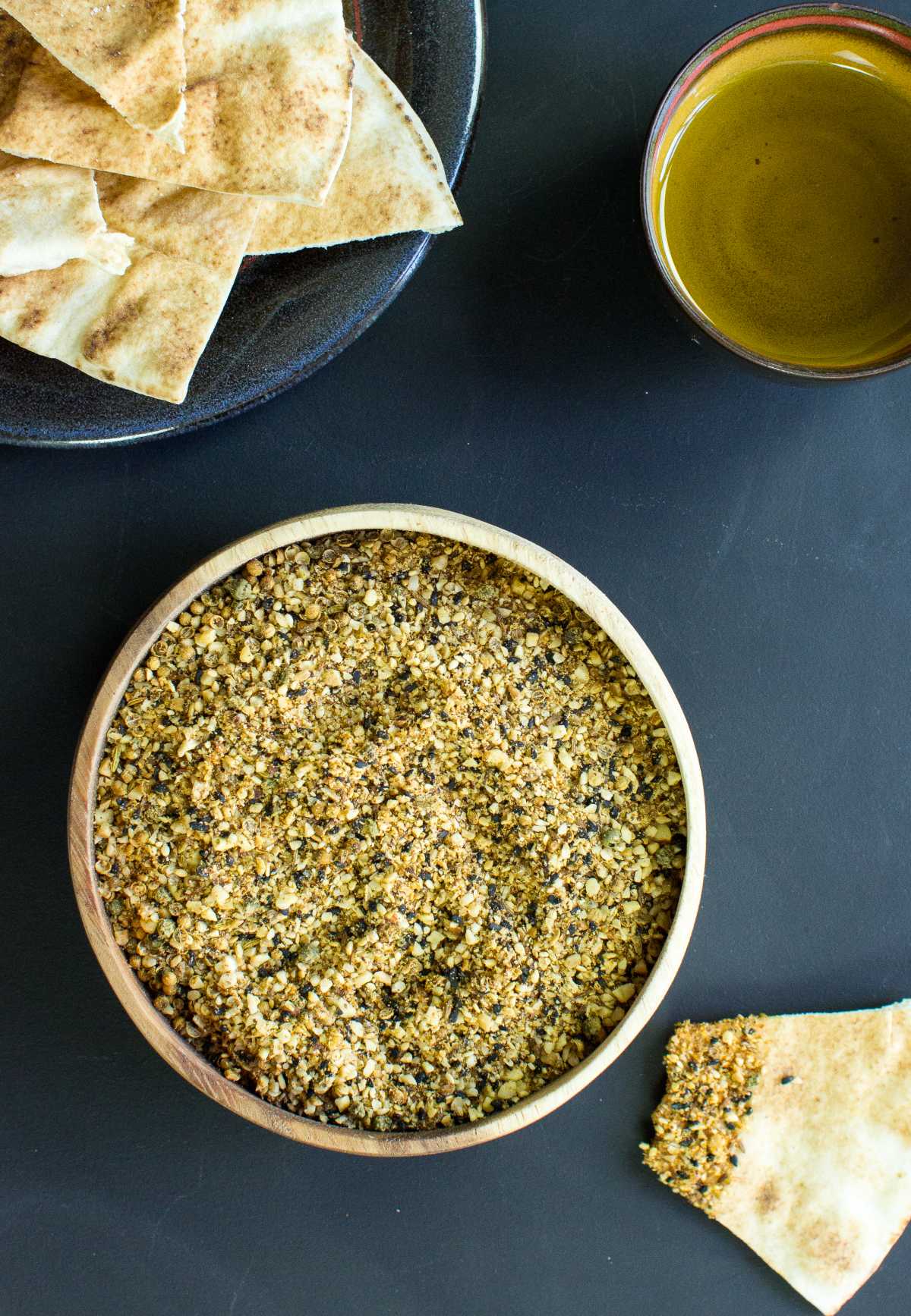 A bowl of dukkah, some pitta, olive oil & pitta dipper in dukkah | Hurry The Food Up