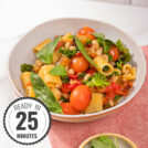 Saucy eggplant tomato pasta is in the white plate on the pink napkin with a time badge in the bottom left corner | Hurry The Food Up