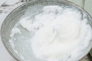 The process of whisking the egg white until it has stiff peaks for protein pancakes' batter | Hurry The Food Up