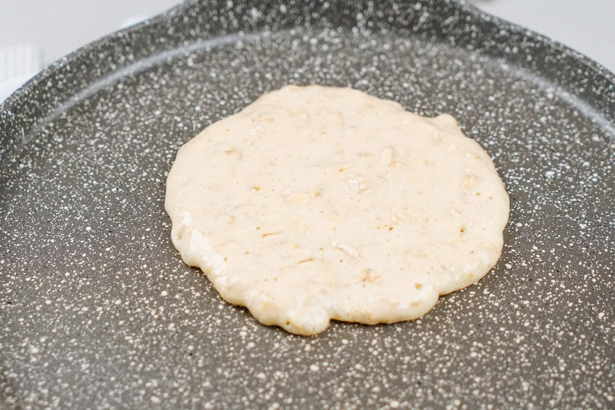 The process of pouring batter onto the pan to make pancake shapes | Hurry The Food Up