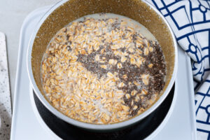 The process of cooking rolled oats and chia seeds in the pot | Hurry The Food Up