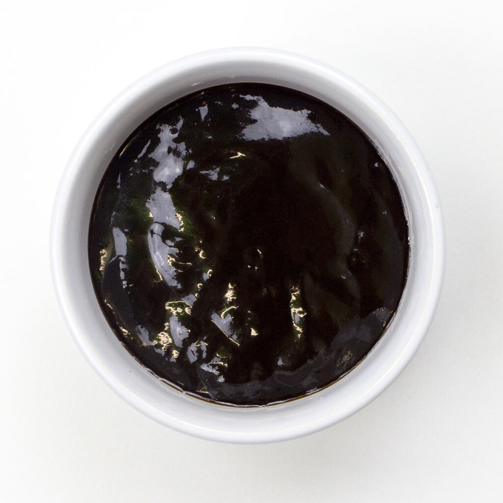 Hoisin sauce on white surface