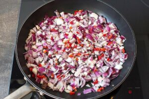 Red Onion Chutney - Sweet and Sour gives us Power - diced red onion in a large pan #dark brown sugar #vegan | 