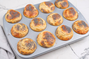 The baked muffins with golden top are in the muffin cups | Hurry The Food Up