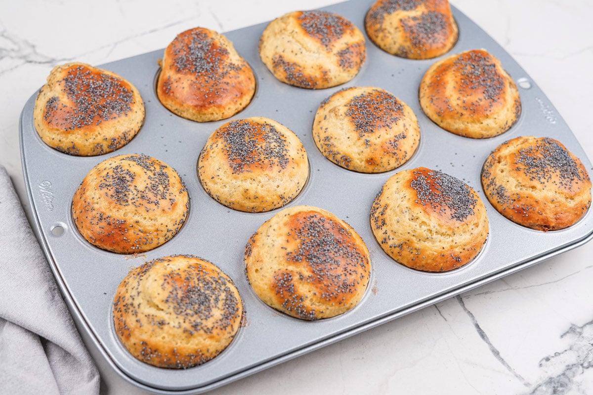 The baked muffins with golden top are in the muffin cups | Hurry The Food Up