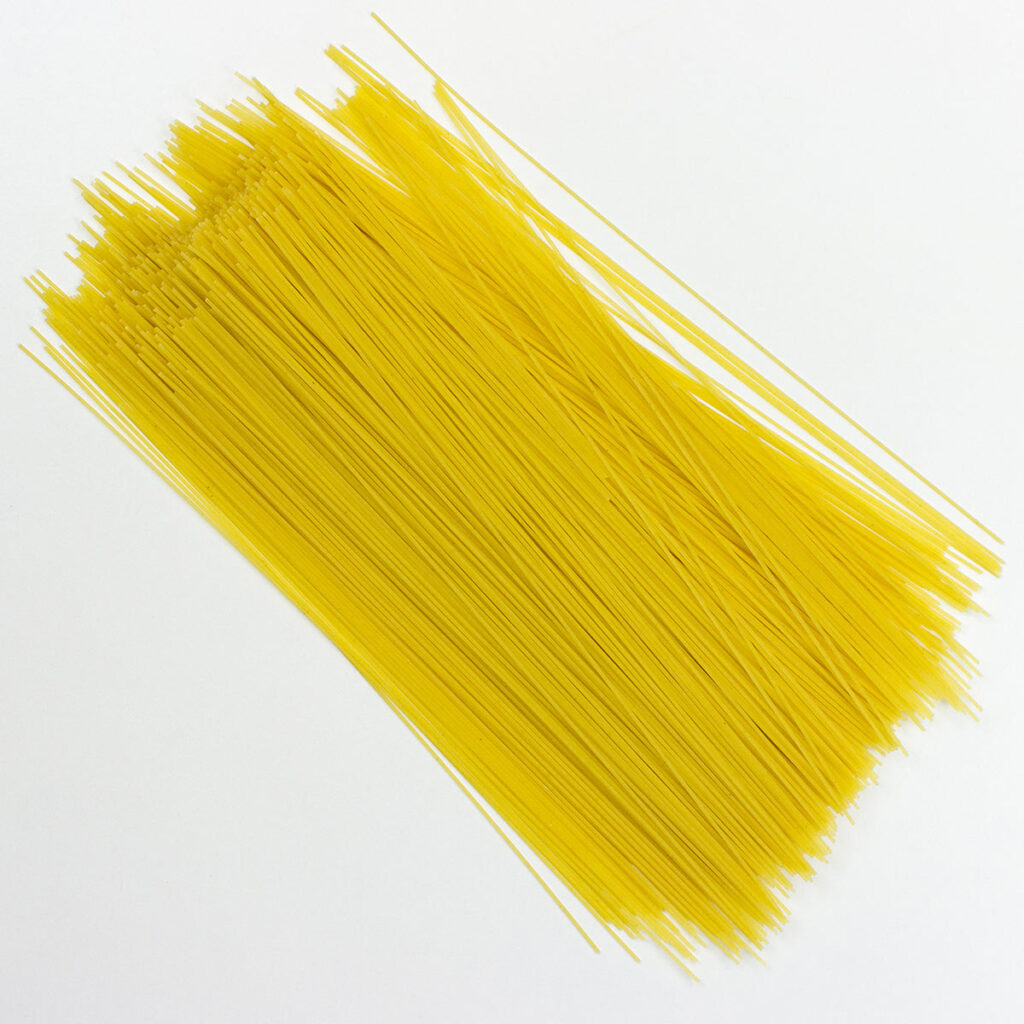 Spaghetti on white surface