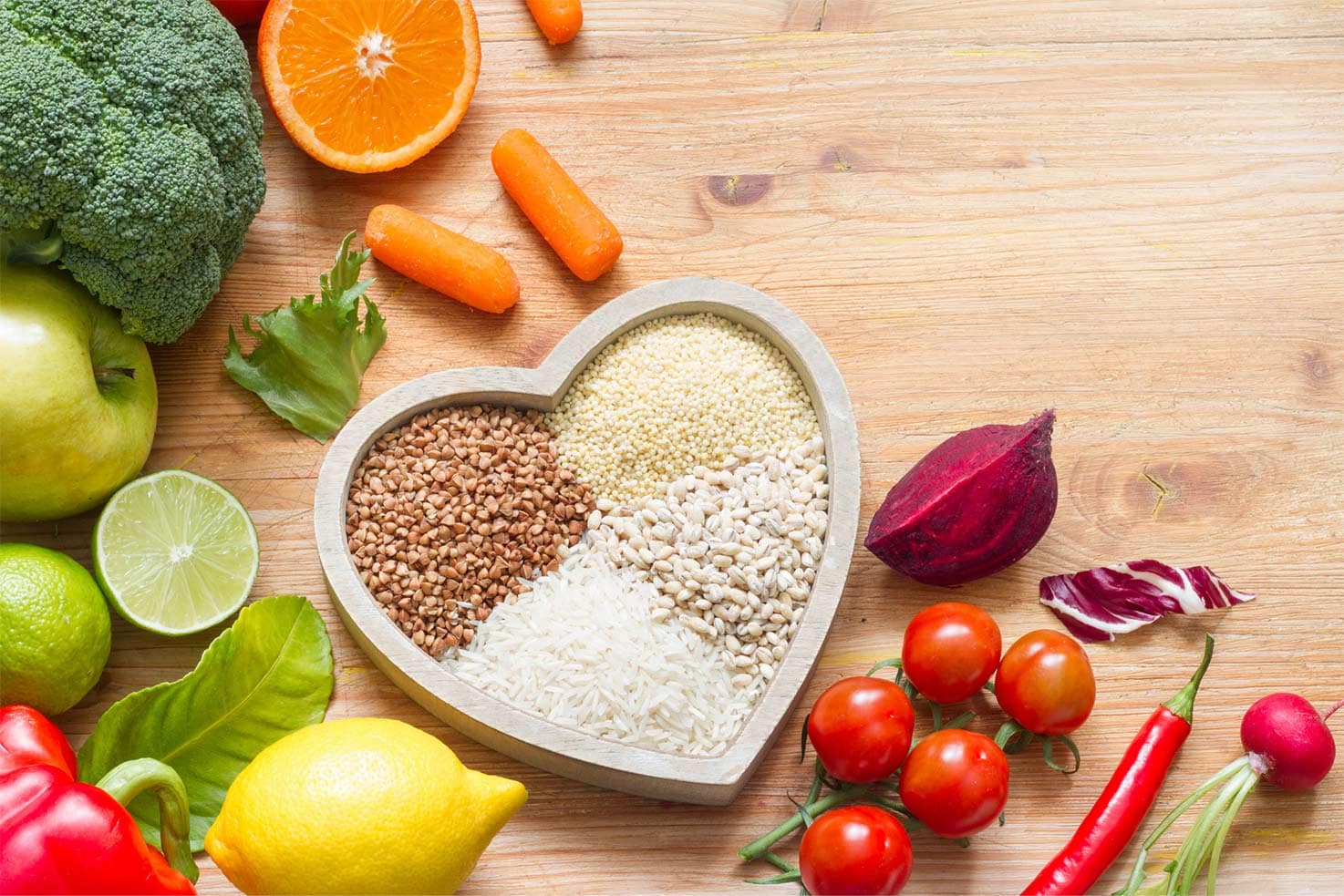 Fruits, vegetables and grains on the wooden background | Hurry The Food Up