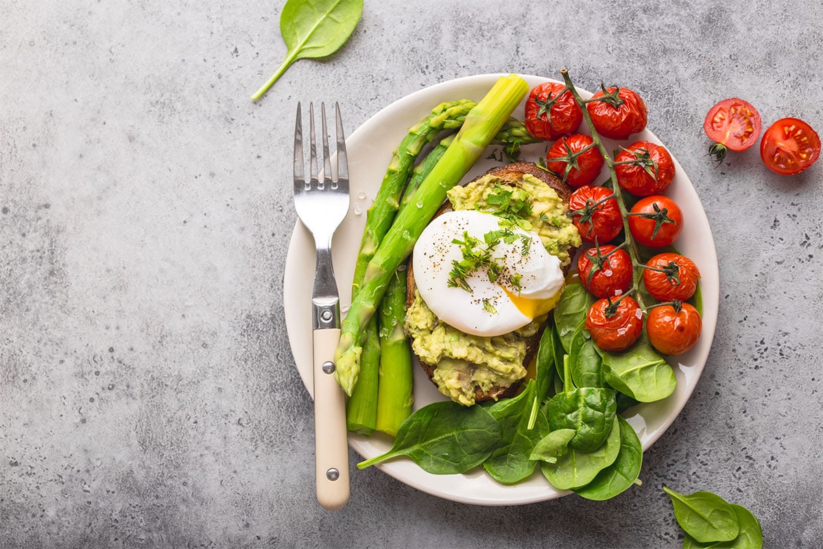 A plate of vegetarian meal on a grey surface | Hurry The Food Up